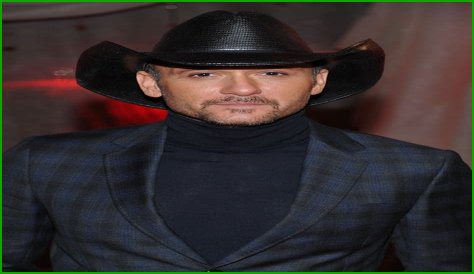 Ooh la la! Slimmed down Tim McGraw ditches the cowboy hat for a beret on trip to Europe